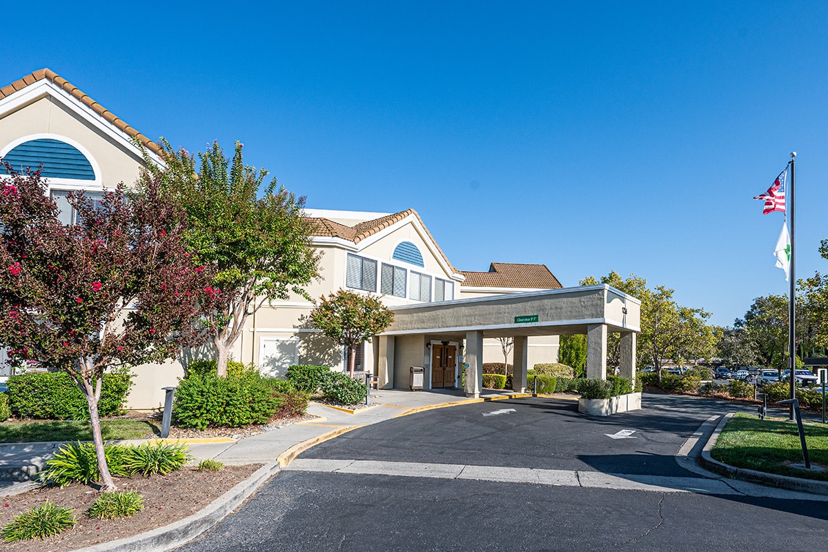 Front of facility with flag pole